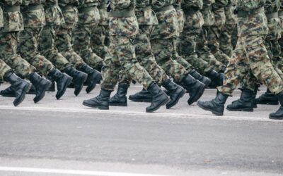 men in green and brown camouflage uniform