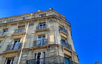 beige concrete high-rise building