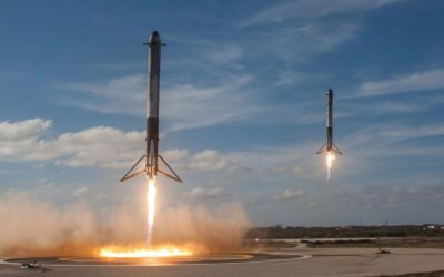 twom white flying rockets during daytime