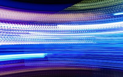 a blurry photo of blue and white lights