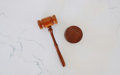 wooden gavel and block on marble