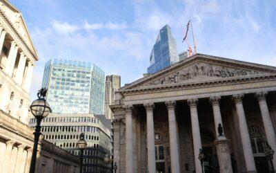 a building with columns and a flag