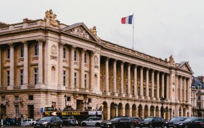 a large building with a flag on top of it