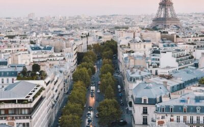 busy street near Eiffel Tower in Paris during daytime