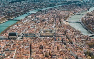 an aerial view of a city with a river running through it