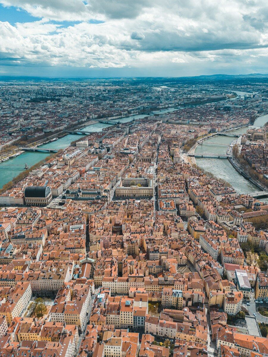 an aerial view of a city with a river running through it